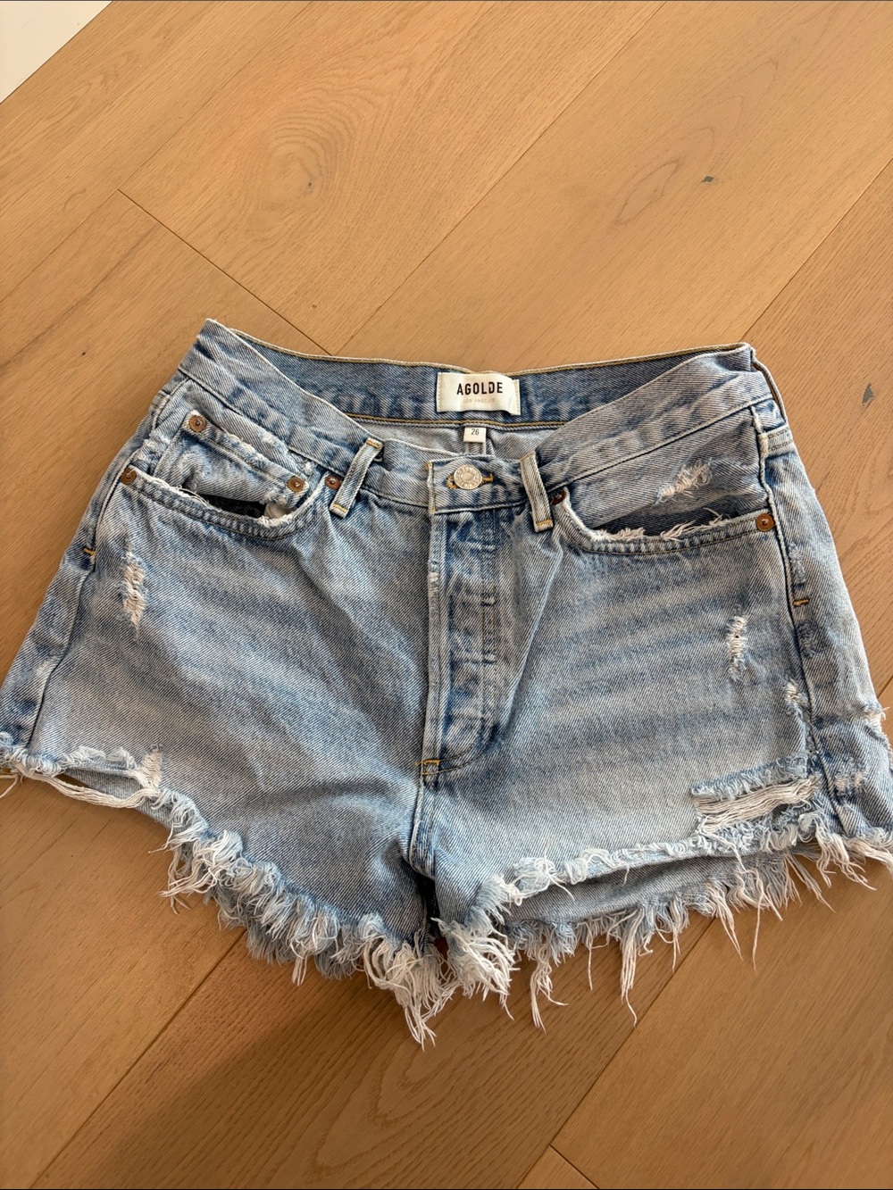 Agolde Faded Light Blue Distressed Cutoff Jean Shorts